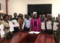 Liberian farmers receive cash disbursements from the Ministry of Agriculture under the $4M agriculture program to boost rice and crop production across eight counties.
