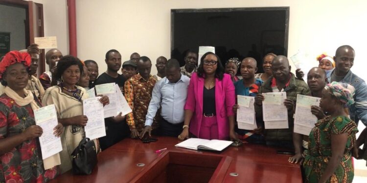 Liberian farmers receive cash disbursements from the Ministry of Agriculture under the $4M agriculture program to boost rice and crop production across eight counties.