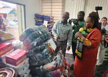 ECOWAS Resident Representative Josephine Nkrumah presenting humanitarian donations during ECOWAS’s 50th anniversary celebration in Monrovia, Liberia.
