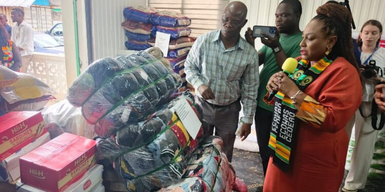 ECOWAS Resident Representative Josephine Nkrumah presenting humanitarian donations during ECOWAS’s 50th anniversary celebration in Monrovia, Liberia.