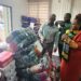 ECOWAS Resident Representative Josephine Nkrumah presenting humanitarian donations during ECOWAS’s 50th anniversary celebration in Monrovia, Liberia.