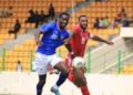 Liberia’s Lone Star forward battles an Equatorial Guinea defender during a 2026 FIFA World Cup qualifier match at Samuel Kanyon Doe Stadium in Monrovia