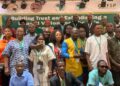 A group photo of government officials, donor partners, farmers’ representatives and private-sector stakeholders at Liberia’s national dialogue on attracting investment in the rice value chain, held at the EJS Ministerial Complex in Monrovia.
