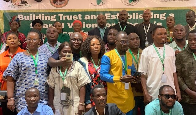 A group photo of government officials, donor partners, farmers’ representatives and private-sector stakeholders at Liberia’s national dialogue on attracting investment in the rice value chain, held at the EJS Ministerial Complex in Monrovia.
