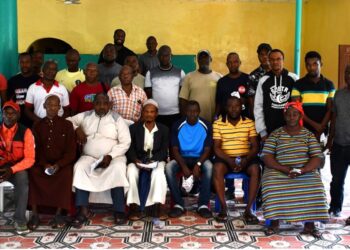 Group photo of taxpayers, community leaders, and LRA officials during a tax-education town-hall session in western Liberia.