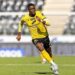 Emmanuel Gono, 19-year-old Liberian forward on loan at IK Start, sprinting during a league match in Norway after being called up to the Liberia national team