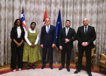Liberian Foreign Minister Sara Beysolow Nyanti and Serbian officials pose after signing a strategic football cooperation deal aimed at reviving the Lone Star