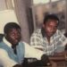 A young Mohamed Koneh (left) and journalist Omari Jackson (right) in the 1980s, discussing the move that would launch George Weah’s football career in Cameroon.