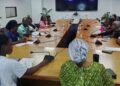 Adolescent girls and women engage in an intergenerational dialogue at One UN House in Monrovia during Liberia’s International Day of the Girl Child event