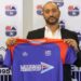Belgian coach Alain-André Landeut holds a LISCR FC jersey during his unveiling ceremony before resigning after two months in charge of the Liberian club.