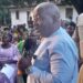CMC political leader Musa Bility speaks to Bong County residents during the groundbreaking of a $500,000 Jor River bridge project, challenging Senator Prince Moye to deliver on road construction