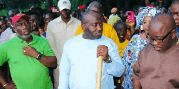 Citizens Movement for Change leader Musa Hassan Bility visits the halted bridge construction site in Gbarnga, Bong County, amid controversy over the government’s suspension order.