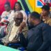 Unity Party Chairman Rev. Luther Tarpeh speaks with ANC Political Leader Alexander Cummings during the ANC National Convention in Margibi County, calling for political cooperation to support Liberia’s progress.