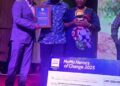 Den-Vera Medical Laboratory and Clinic founders receiving the 2025 Lonestar Cell MTN MoMo Heroes of Change Award with a symbolic cheque for LRD 1.5 million in Monrovia