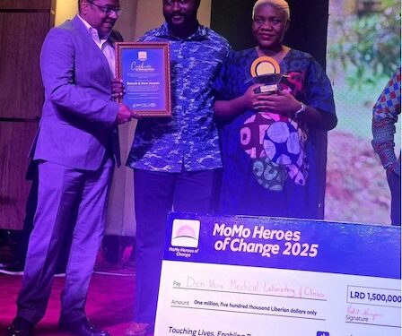 Den-Vera Medical Laboratory and Clinic founders receiving the 2025 Lonestar Cell MTN MoMo Heroes of Change Award with a symbolic cheque for LRD 1.5 million in Monrovia