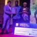 Den-Vera Medical Laboratory and Clinic founders receiving the 2025 Lonestar Cell MTN MoMo Heroes of Change Award with a symbolic cheque for LRD 1.5 million in Monrovia