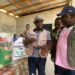 Liberian Agriculture Minister Dr. J. Alexander Nuetah unveils the Gbedin Rice brand and opens the 2025 national rice harvest in Sehyikepa, Nimba County, to boost local production and cut rice imports
