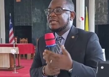 Deputy Finance Minister Bill McGill Jones delivers the keynote address at St. Martin Catholic High School’s graduation in Gbarnga, Bong County.