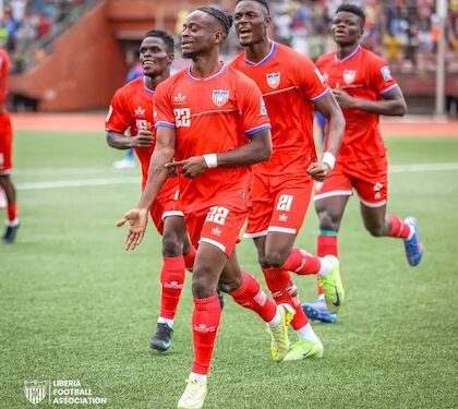 Liberia national football team players celebrate after defeating Namibia 3-1 in the 2026 FIFA World Cup African qualifiers at the SKD Sports Complex.