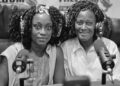 Dominion Global Consulting Group co-founders Naomi Esi Williams and Malinda Williams Kolenda speak on a Liberian radio show about their new sports advocacy and legal support initiative for athletes