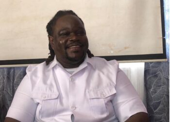 Samuel S. Dean, Executive Director of the National Commission on Disabilities, speaks at a press conference in Monrovia following the protest by visually impaired Liberians