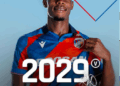 Liberian footballer Sampson Dweh wearing Viktoria Plzeň’s home kit after signing a new contract extension keeping him at the club until 2029.