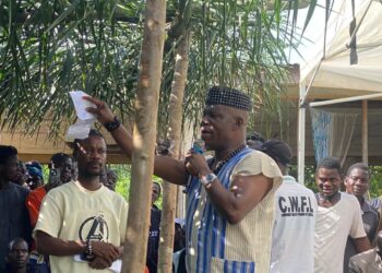 Senator Samuel Kogar addresses Nimba residents during a reconciliation meeting, urging political unity and warning against division among county leaders