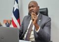 Nimba County Senator Nya D. Twayen Jr. addresses journalists on Capitol Hill, calling for transparency and community benefits in the US$37 million Ivanhoe Liberia rail-port deal