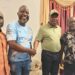 Liberia Vice President Jeremiah Koung standing and smiling as he greets supporters in Monrovia after returning from Ghana, dismissing speculation about his health