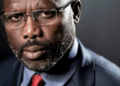Former Liberian President George Weah appears in a portrait-style photograph amid controversy over a false report claiming he would meet with U.S. President Donald Trump.