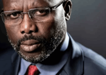 Former Liberian President George Weah appears in a portrait-style photograph amid controversy over a false report claiming he would meet with U.S. President Donald Trump.