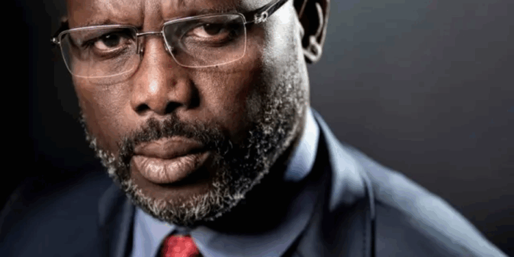 Former Liberian President George Weah appears in a portrait-style photograph amid controversy over a false report claiming he would meet with U.S. President Donald Trump.