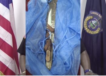 A knife and cutlass displayed by the Liberia National Police after a deadly Congo Town confrontation where a suspect attacked three officers before being fatally shot.