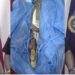A knife and cutlass displayed by the Liberia National Police after a deadly Congo Town confrontation where a suspect attacked three officers before being fatally shot.