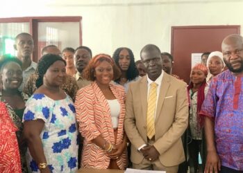 Officials from the Environmental Protection Agency, Monrovia City Corporation, and partners pose after signing an MOU to launch the Solid Waste Management Transformative Pilot Project in Monrovia.