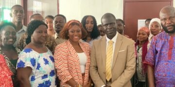 Officials from the Environmental Protection Agency, Monrovia City Corporation, and partners pose after signing an MOU to launch the Solid Waste Management Transformative Pilot Project in Monrovia.
