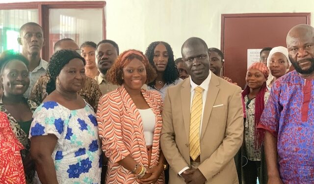 Officials from the Environmental Protection Agency, Monrovia City Corporation, and partners pose after signing an MOU to launch the Solid Waste Management Transformative Pilot Project in Monrovia.
