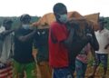 local miners and community remembers carrying the remains of their colleague