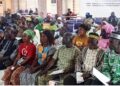 Chiefs, elders, women leaders, and local residents at a ceremony in Ganta celebrating the historic presentation of customary land deeds to 23 rural communities across Liberia by the LLA and UNDP