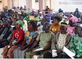Chiefs, elders, women leaders, and local residents at a ceremony in Ganta celebrating the historic presentation of customary land deeds to 23 rural communities across Liberia by the LLA and UNDP