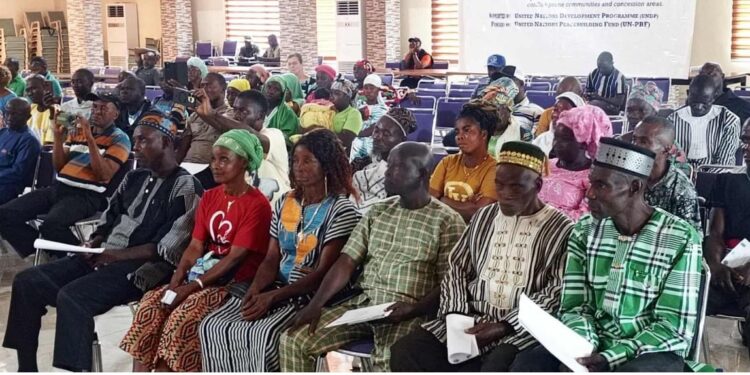 Chiefs, elders, women leaders, and local residents at a ceremony in Ganta celebrating the historic presentation of customary land deeds to 23 rural communities across Liberia by the LLA and UNDP