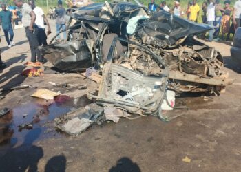 Wreckage of a taxi involved in a deadly head-on collision along the Suakoko–Monrovia Highway in Bong County that killed seven people, including a baby