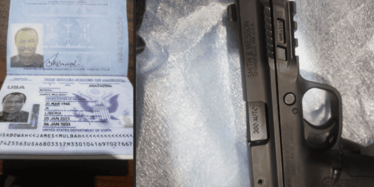 A Liberian passport belonging to James Mulbah Bowah displayed alongside the SMITH & WESSON pistol seized at Roberts International Airport during an alleged firearm smuggling investigation by the Liberia National Police