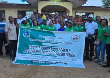 A large group of Nimba County residents, local leaders, and MFDP officials pose together during the launch of Liberia’s 2025 Budget Outreach and FY2026 Pre-Budget Consultation in Sanniquellie, promoting fiscal decentralization and citizen inclusion