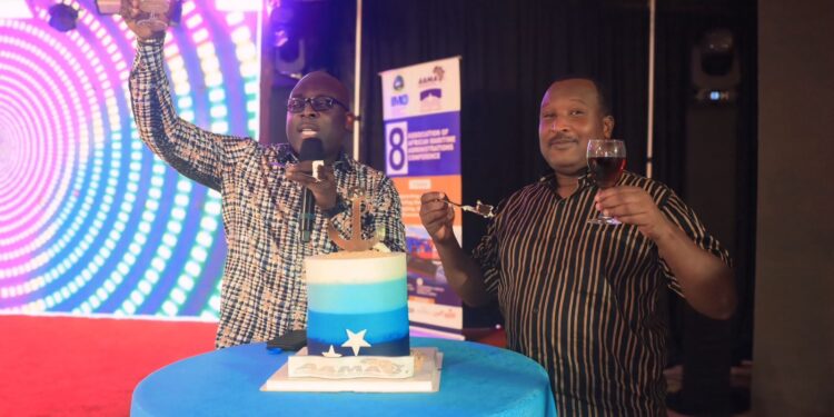 Liberia Maritime Authority Commissioner Neto Zarzar Lighe Sr. and an official toast during the AAMA 2025 Conference in Monrovia celebrating the country’s successful hosting of Africa’s landmark maritime summit