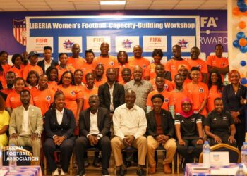 Group photo of Liberia Football Association officials, FIFA experts, and women’s football stakeholders at the launch of the capacity-building workshop in Monrovia