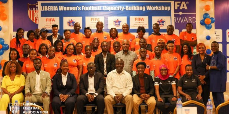 Group photo of Liberia Football Association officials, FIFA experts, and women’s football stakeholders at the launch of the capacity-building workshop in Monrovia