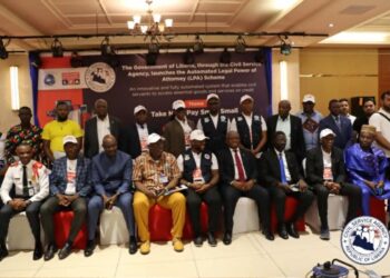 Liberian and UN officials pose for a group photo at the Peacebuilding Impact Country Spotlight consultation in Monrovia, aimed at reviewing Liberia’s post-war peace efforts