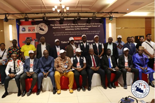 Liberian and UN officials pose for a group photo at the Peacebuilding Impact Country Spotlight consultation in Monrovia, aimed at reviewing Liberia’s post-war peace efforts