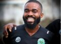 Wologizi FC forward Jeremiah Johnson celebrates after scoring in their 2–1 win over FC Fassell in the Liberia First Division League